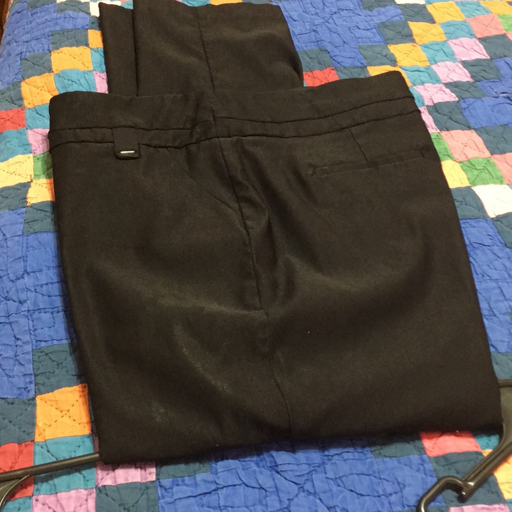 Black pull on dress pants.